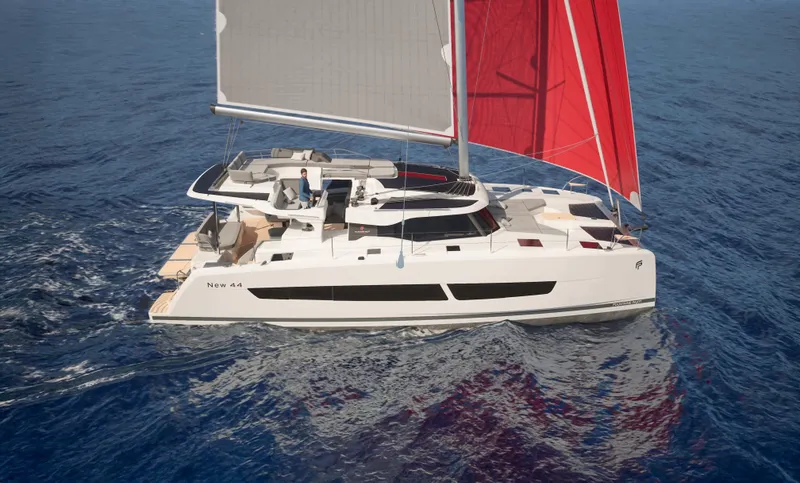 Slide: The Image of Couple enjoying snacks on a 2026 Fountaine Pajot 44 yacht, with scenic ocean backdrop. - 27