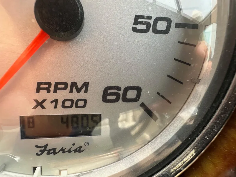 Slide: The Image of Close-up of a 2005 Rinker Fiesta Vee 300 tachometer showing RPM gauge. - 16