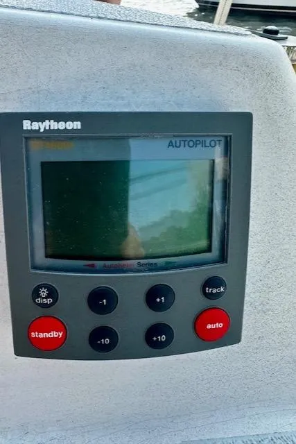 Slide: The Image of Raytheon autopilot display on a 1998 Freedom 35 boat. - 13