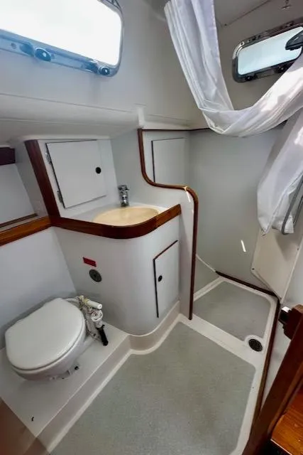 Slide: The Image of Bathroom interior of 1998 Freedom 35 yacht with shower and toilet. - 5