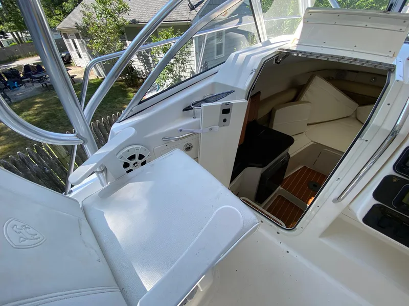 Slide: The Image of Close-up of a Century 2600 Walkaround 2006 boat tachometer displaying 384.5 hours. - 11