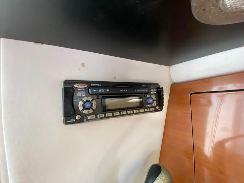 Slide: The Image of Jensen stereo system in 2006 Century 2600 Walkaround boat interior. - 27