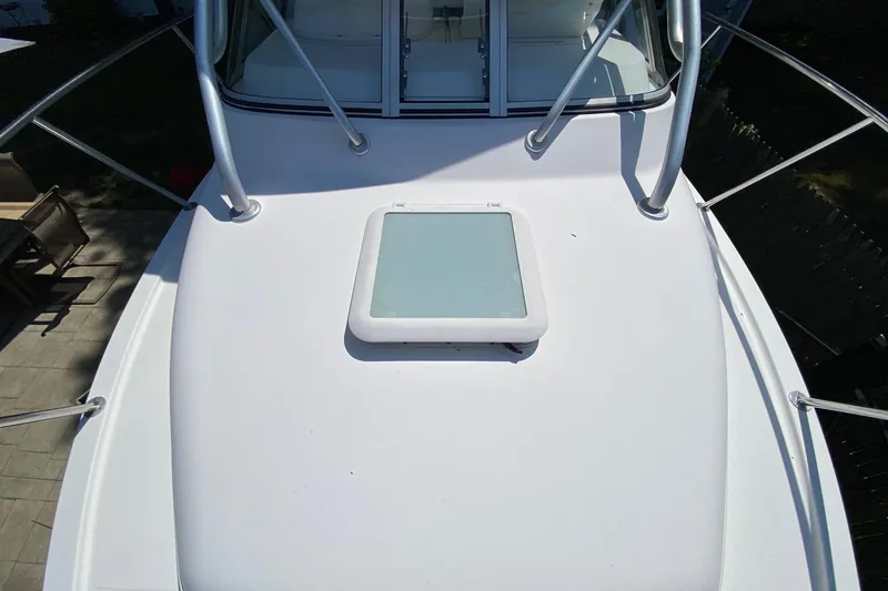 Slide: The Image of 2006 Century 2600 Walkaround boat deck with hatch and railing. - 29