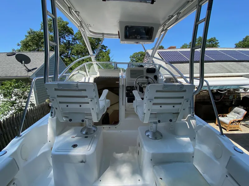 Slide: The Image of Helm of 2006 Century 2600 Walkaround with Garmin and Raymarine electronics. - 5