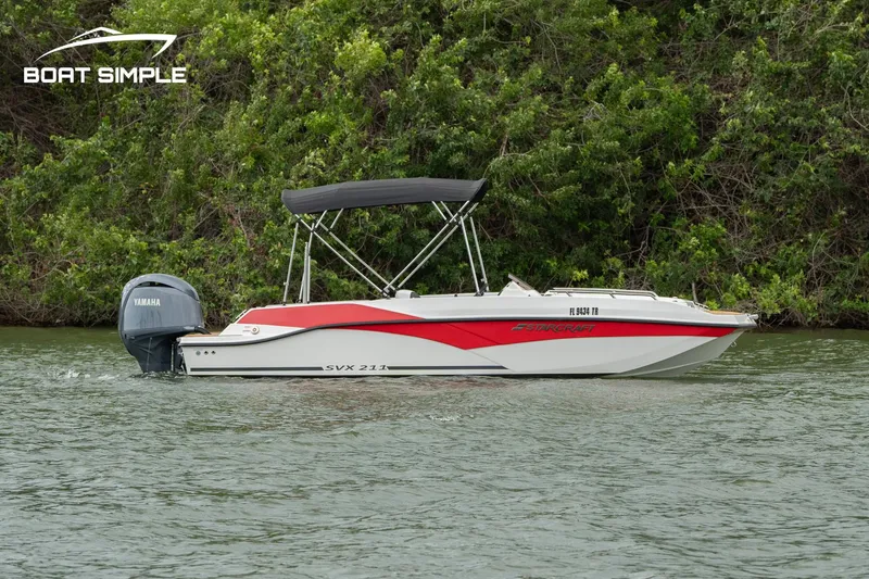 Slide: The Image of 2024 Starcraft SVX 211 OB boat on water, featuring a Yamaha outboard motor. - 3