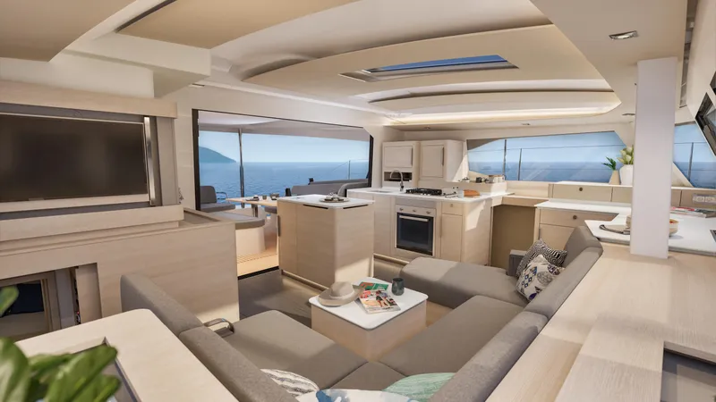 Slide: The Image of Woman in a modern kitchen on a 2026 Fountaine Pajot 44 yacht, holding a hat. - 17