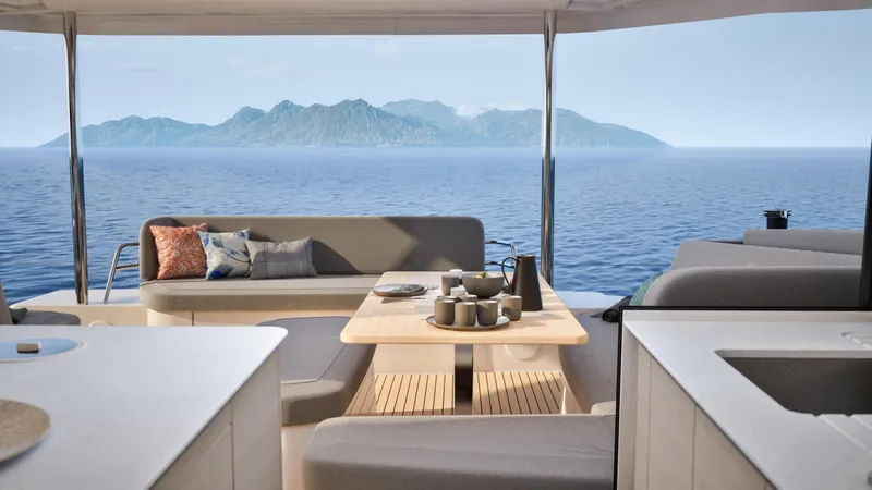 Slide: The Image of People relaxing on a 2026 Fountaine Pajot 44 yacht, enjoying the sun and sea. - 14