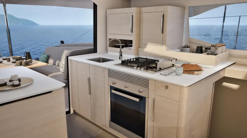 Slide: The Image of 2026 Fountaine Pajot 44 yacht with people relaxing on deck under sail. - 18
