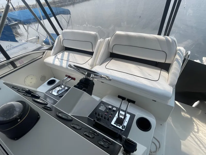 Slide: The Image of 1994 Carver 380 Santego SE helm with dual seats and control panel. - 22