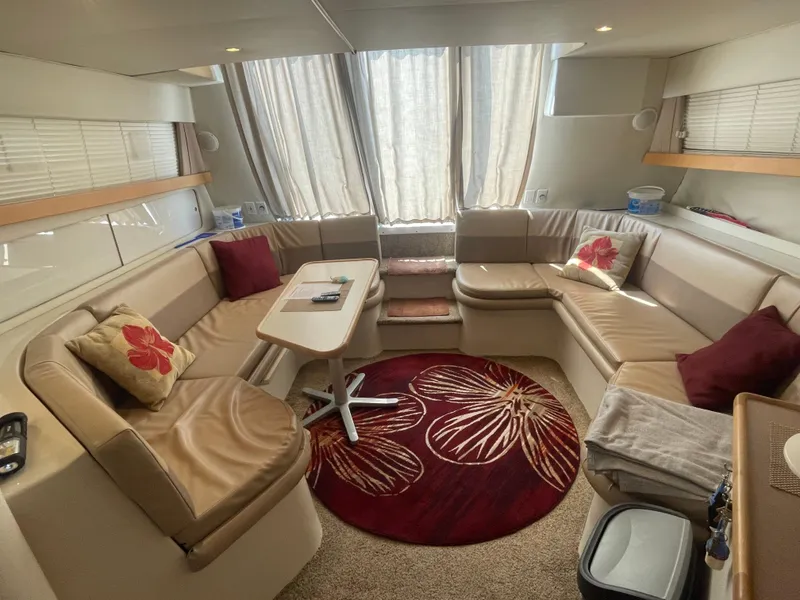 Slide: The Image of Luxurious interior of a 1994 Carver 380 Santego SE yacht with plush seating and elegant decor. - 30