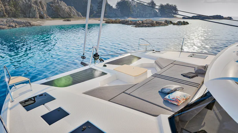 Slide: The Image of 2026 Fountaine Pajot 44 catamaran sailing with passengers on a sunny day. - 9