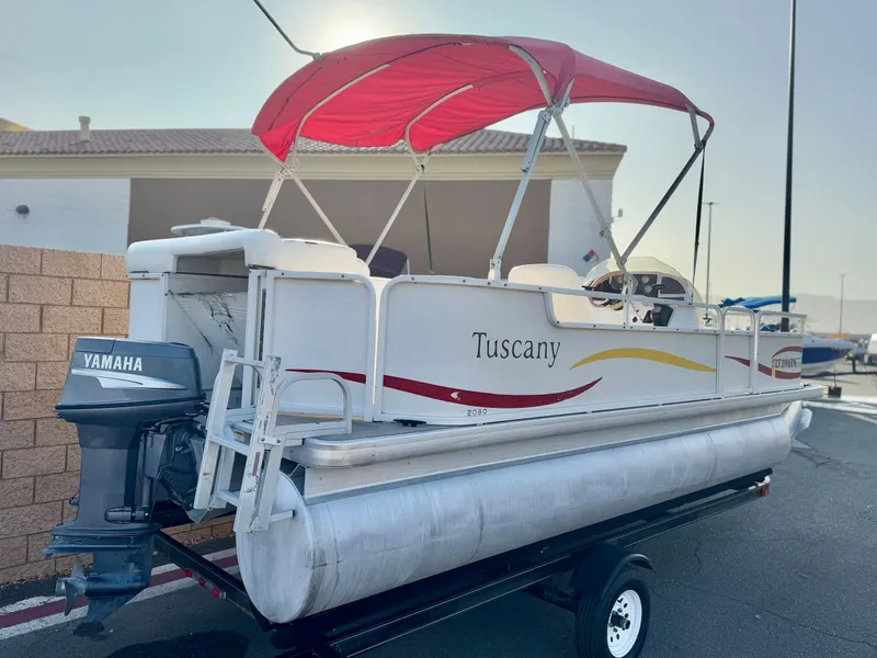 Slide: The Image of 2006 Godfrey Tuscany 2080 pontoon boat with Yamaha motor and red canopy. - 6
