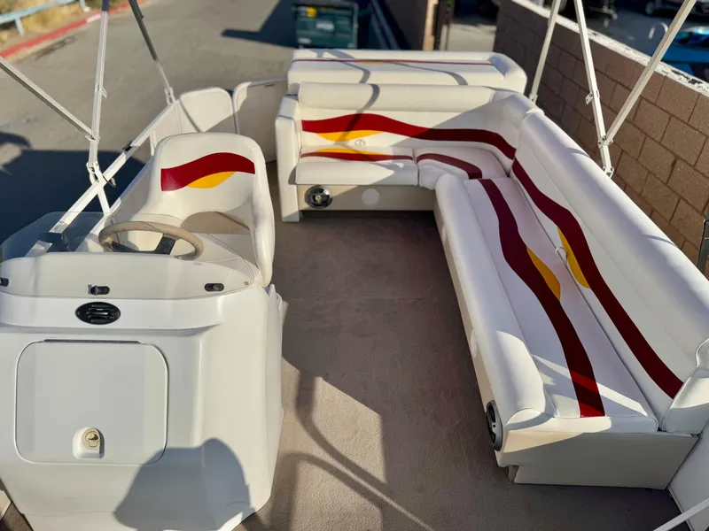 Slide: The Image of 2006 Godfrey Tuscany 2080 pontoon boat interior with white and red seating. - 9