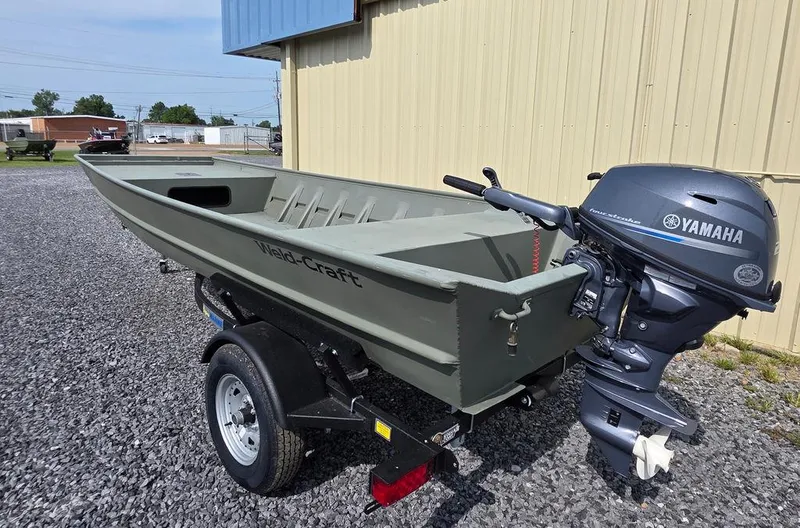 Slide: The Image of 2023 Weldcraft 1544-CDS boat with 2025 Yamaha F25 outboard motor on trailer. - 2