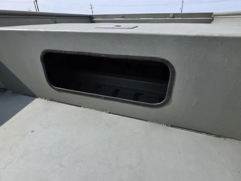 Slide: The Image of 2023 Weldcraft 1544-CDS boat storage compartment, open and empty. - 7