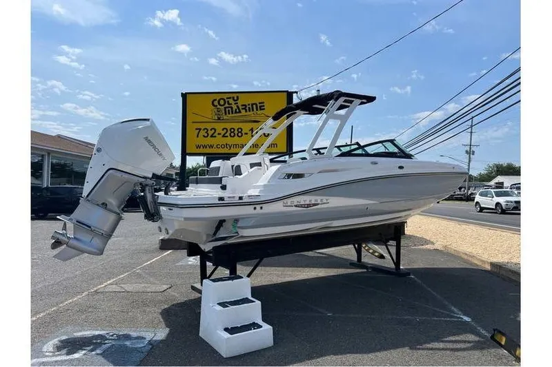 Slide: The Image of 2026 Monterey M-45 boat displayed at Coty Marine dealership. - 3