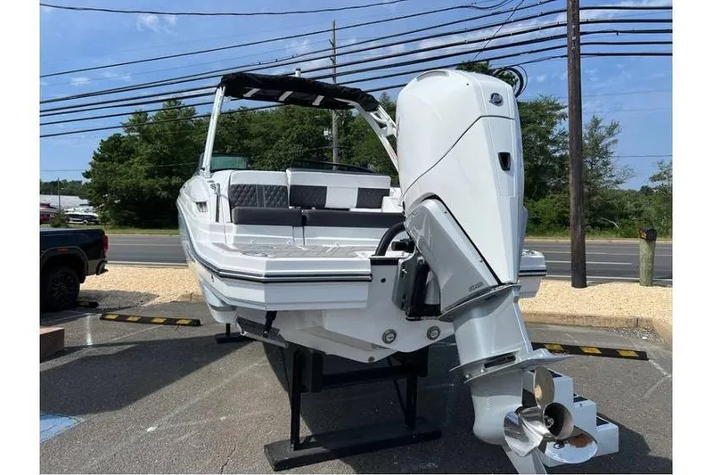 Slide: The Image of 2026 Monterey M-45 boat with powerful outboard motor on display outdoors. - 5