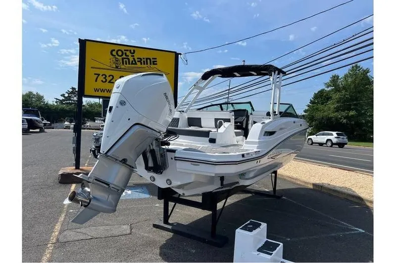 Slide: The Image of 2026 Monterey M-45 boat displayed at Coty Marine dealership. - 6