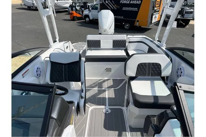 Slide: The Image of 2026 Monterey M-45 boat interior with modern seating and sleek design. - 9