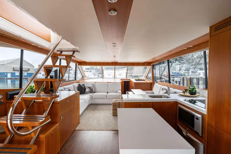 Slide: The Image of Luxurious interior of 2010 Maritimo M56 yacht with modern kitchen and seating area. - 3