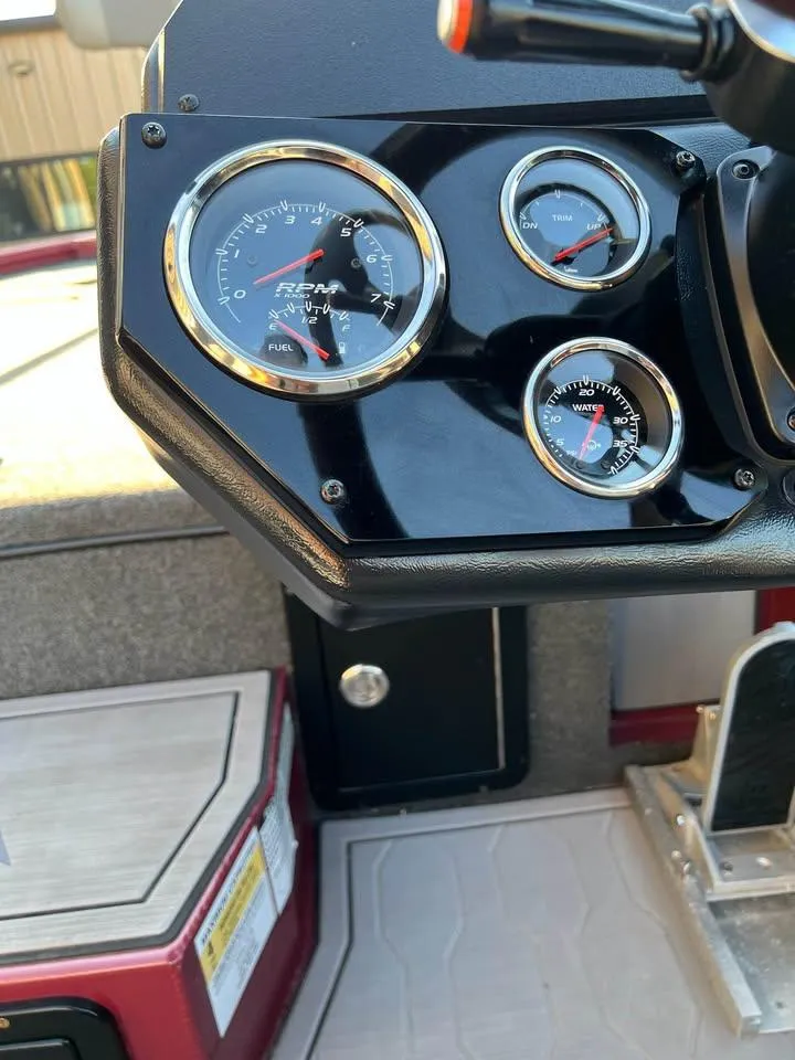 Slide: The Image of Dashboard of 2024 Avid 20 XB boat with gauges and controls. - 10
