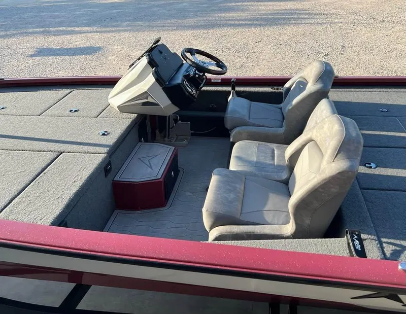 Slide: The Image of 2024 Avid 20 XB boat interior with dual seats and steering console. - 13
