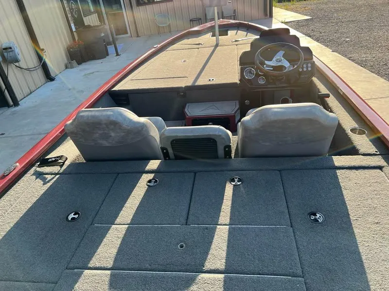 Slide: The Image of 2024 Avid 20 XB boat interior with dual seats and steering console. - 8