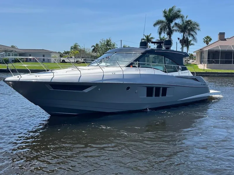 Slide: The Image of 2014 Cruisers Yachts 45 Cantius Black Diamond on a sunny waterway. - 16