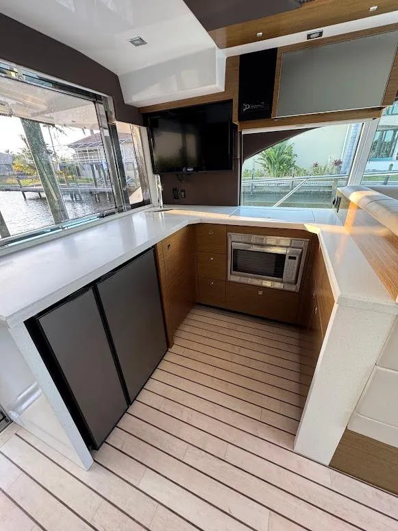 Slide: The Image of Modern kitchen interior of 2014 Cruisers Yachts 45 Cantius Black Diamond. - 19