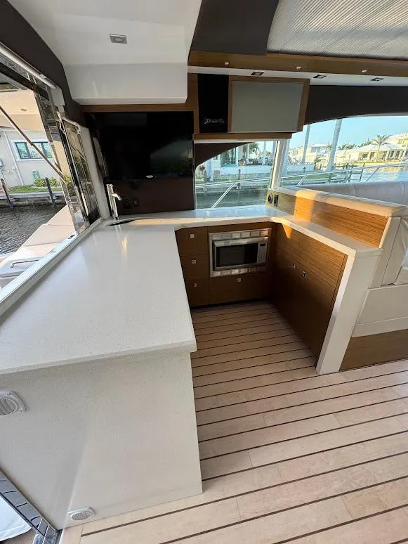 Slide: The Image of Modern kitchen interior of 2014 Cruisers Yachts 45 Cantius Black Diamond. - 28