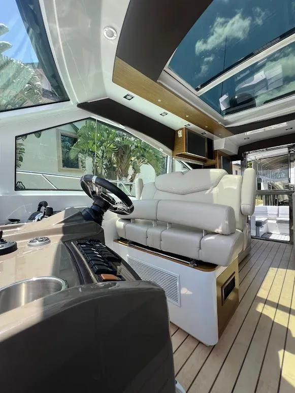 Slide: The Image of Luxurious interior of 2014 Cruisers Yachts 45 Cantius Black Diamond with modern helm and seating. - 34