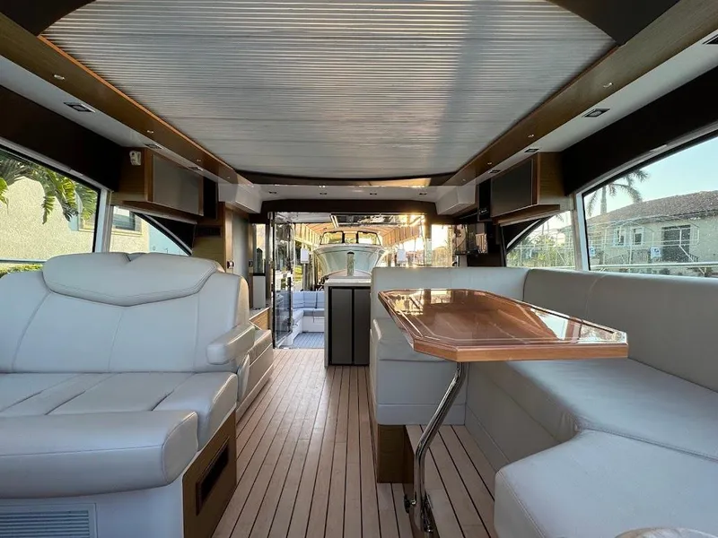 Slide: The Image of Luxurious interior of 2014 Cruisers Yachts 45 Cantius Black Diamond with elegant seating and table. - 35