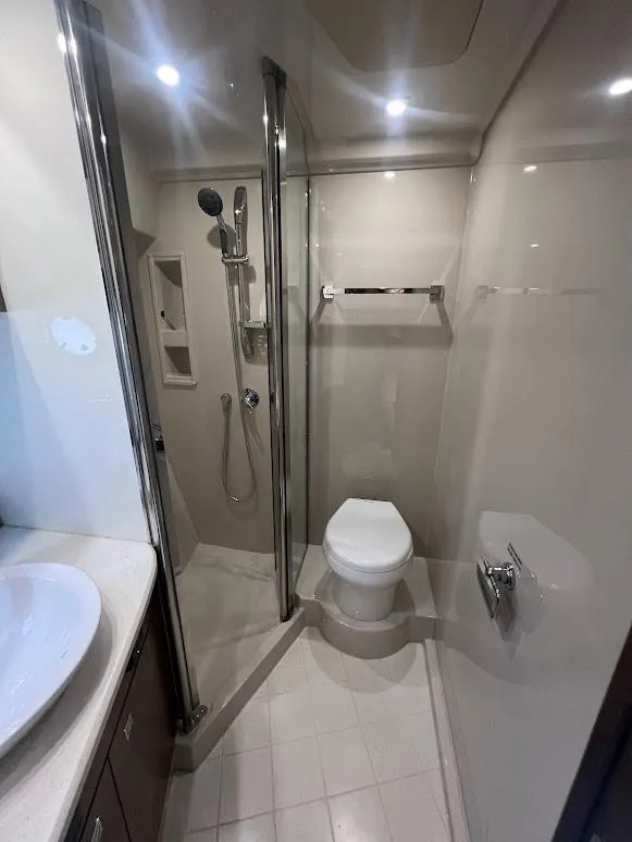 Slide: The Image of Bathroom interior of 2014 Cruisers Yachts 45 Cantius Black Diamond, featuring modern fixtures. - 46