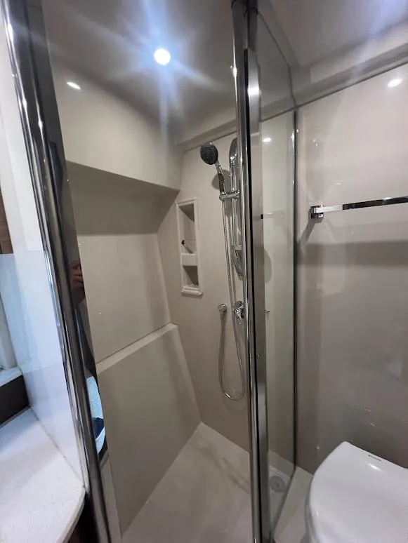 Slide: The Image of 2014 Cruisers Yachts 45 Cantius Black Diamond bathroom with modern shower and sleek design. - 47