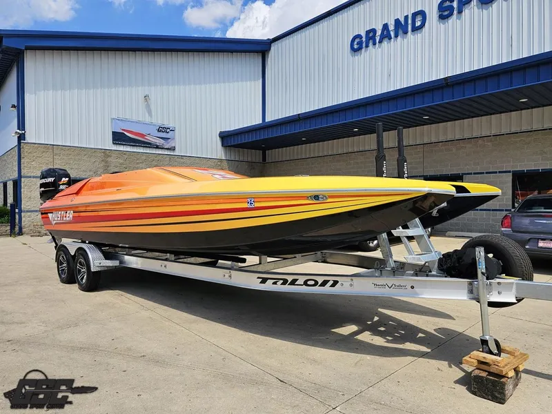 Slide: The Image of 2019 Hustler 25 Talon Cat boat on trailer outside Grand Sport Center. - 18