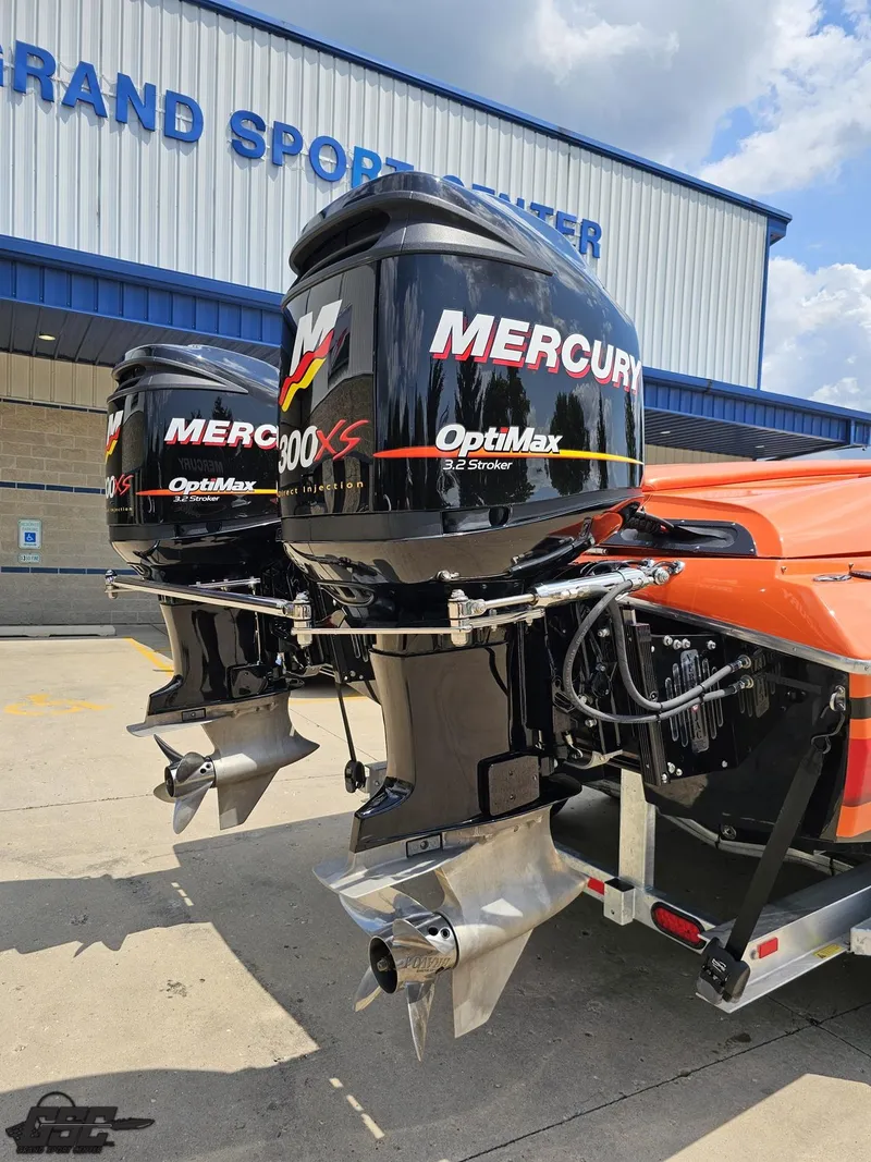 Slide: The Image of Twin Mercury 300XS outboard engines on a 2019 Hustler 25 Talon Cat boat. - 46