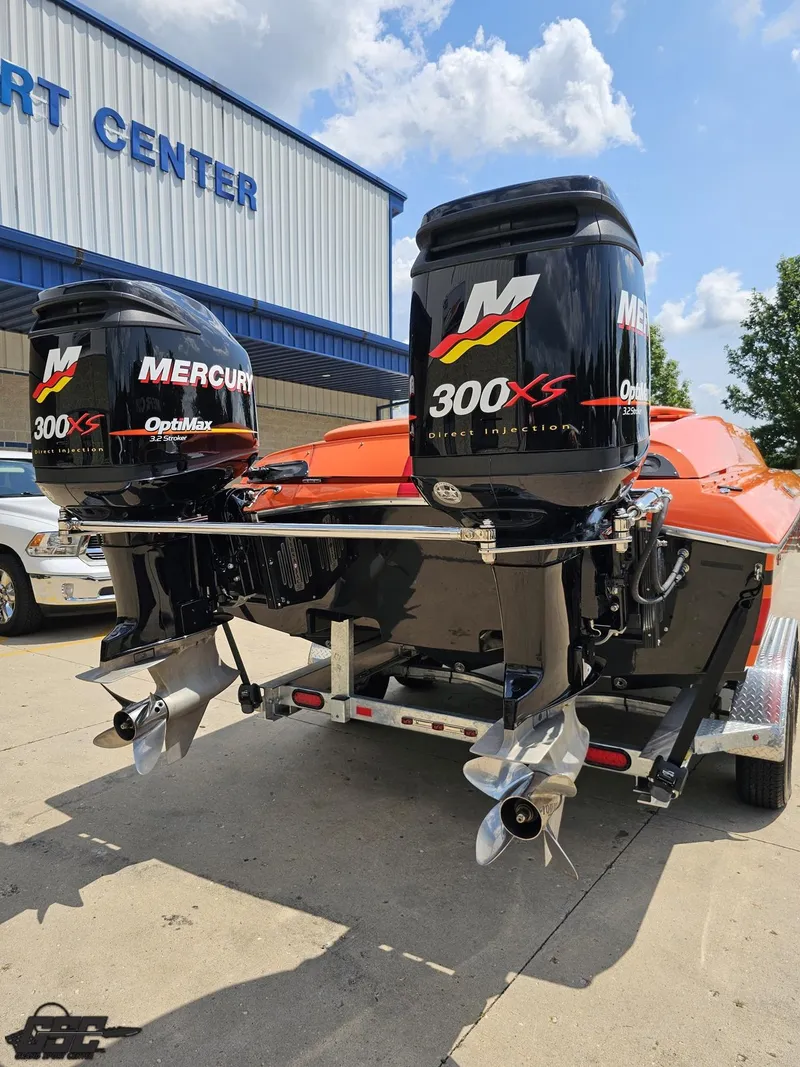 Slide: The Image of 2019 Hustler 25 Talon Cat with dual Mercury 300XS engines at a sport center. - 47