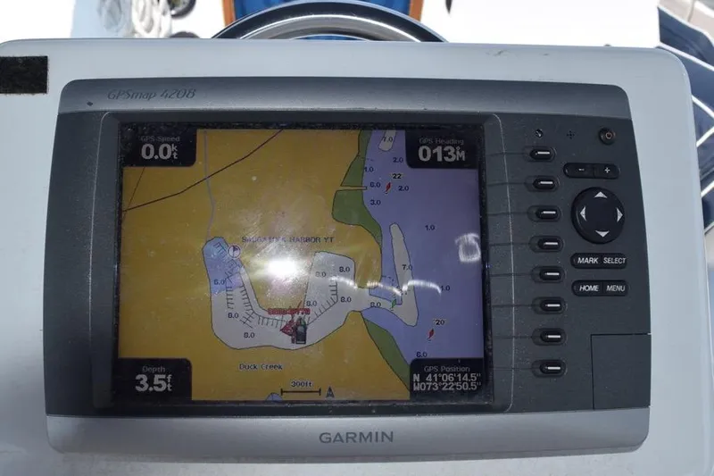 Slide: The Image of Garmin GPSmap 4208 displaying nautical chart on a 1981 C&C 37 sailboat. - 33