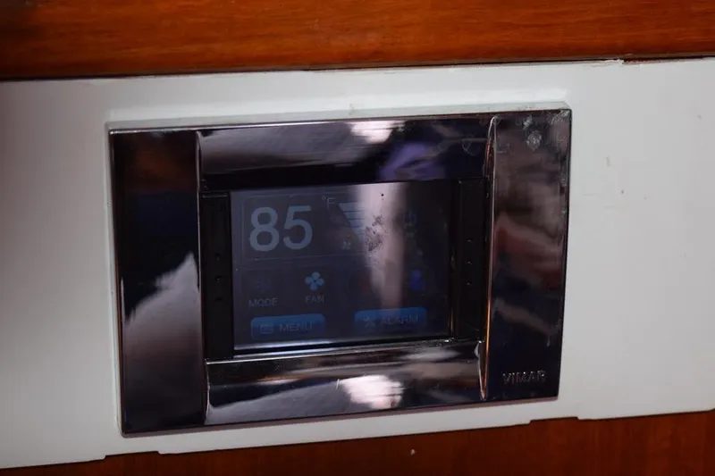 Slide: The Image of Digital control panel on a 1981 C&C 37 yacht, displaying temperature settings. - 34