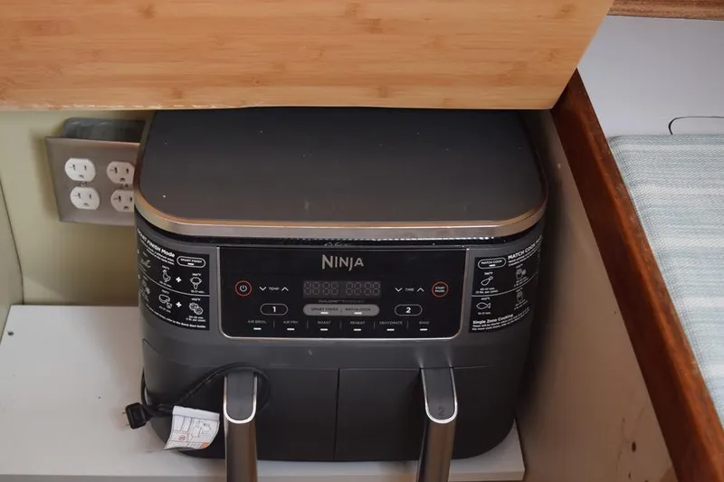 Slide: The Image of Ninja appliance in a compact kitchen space on a 1981 C&C 37 sailboat. - 45