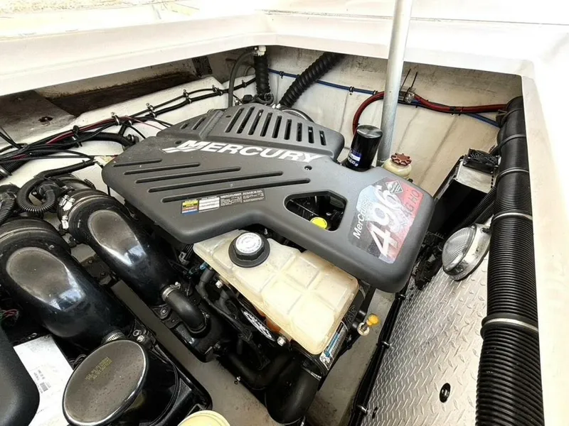 Slide: The Image of Engine compartment of a 2005 Donzi 33ZX boat featuring a Mercury 496 engine. - 47