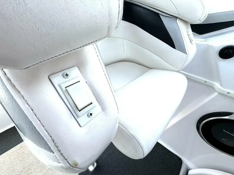 Slide: The Image of White leather seating in a 2005 Donzi 33ZX boat interior. - 20