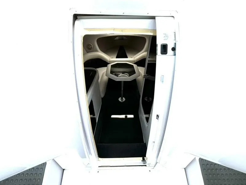 Slide: The Image of Interior view of 2005 Donzi 33ZX boat cabin, featuring sleek design and seating area. - 29