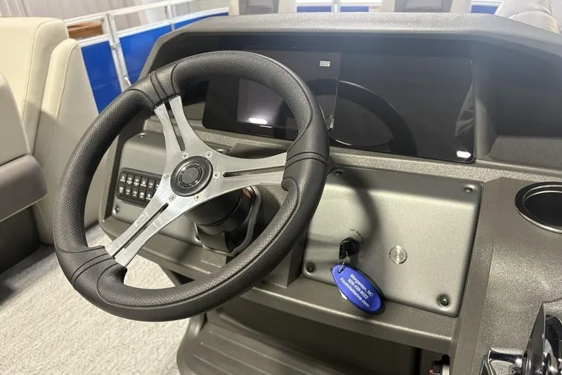 Slide: The Image of Steering wheel of 2026 Sun Tracker Fishin' Barge 20 DLX pontoon boat. - 17