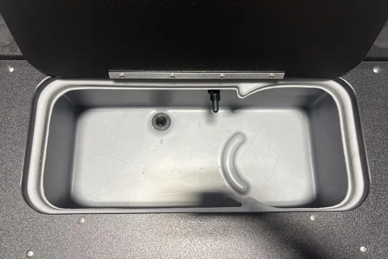 Slide: The Image of Livewell compartment in 2026 Sun Tracker Fishin' Barge 20 DLX boat. - 27