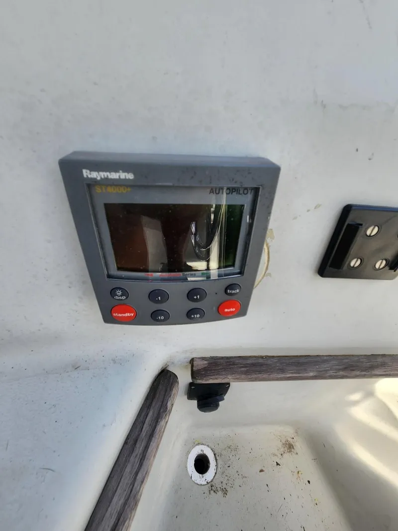 Slide: The Image of Raymarine autopilot control on 1982 C&C 34 sailboat dashboard. - 20