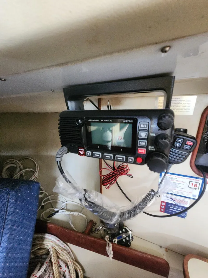Slide: The Image of Radio equipment inside a 1982 C&C 34 sailboat cabin. - 21