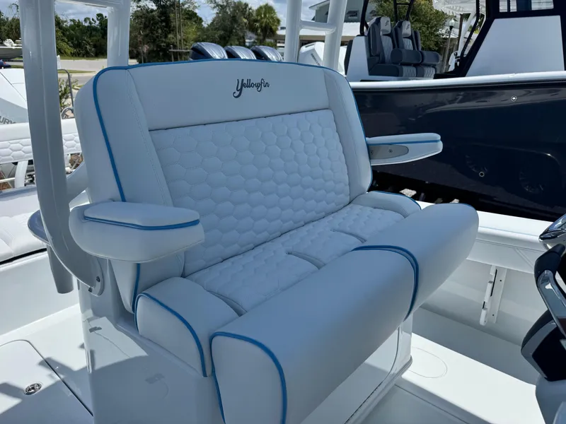 Slide: The Image of Compartment in 2026 Yellowfin 26 Hybrid boat with Garmin device and microphone. - 22