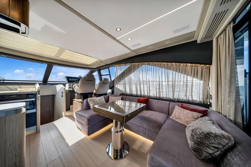 Slide: The Image of Luxurious interior of 2021 Azimut S6 yacht with plush seating and modern design. - 13