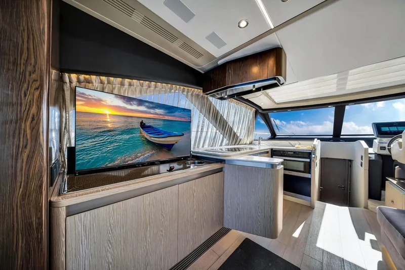 Slide: The Image of Luxurious interior of 2021 Azimut S6 yacht with modern kitchen and scenic view. - 14
